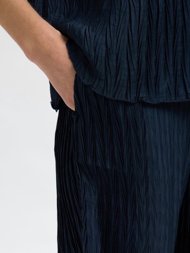 Pantalón plisado azul